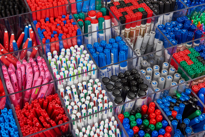 Pen pot full of pens and markers